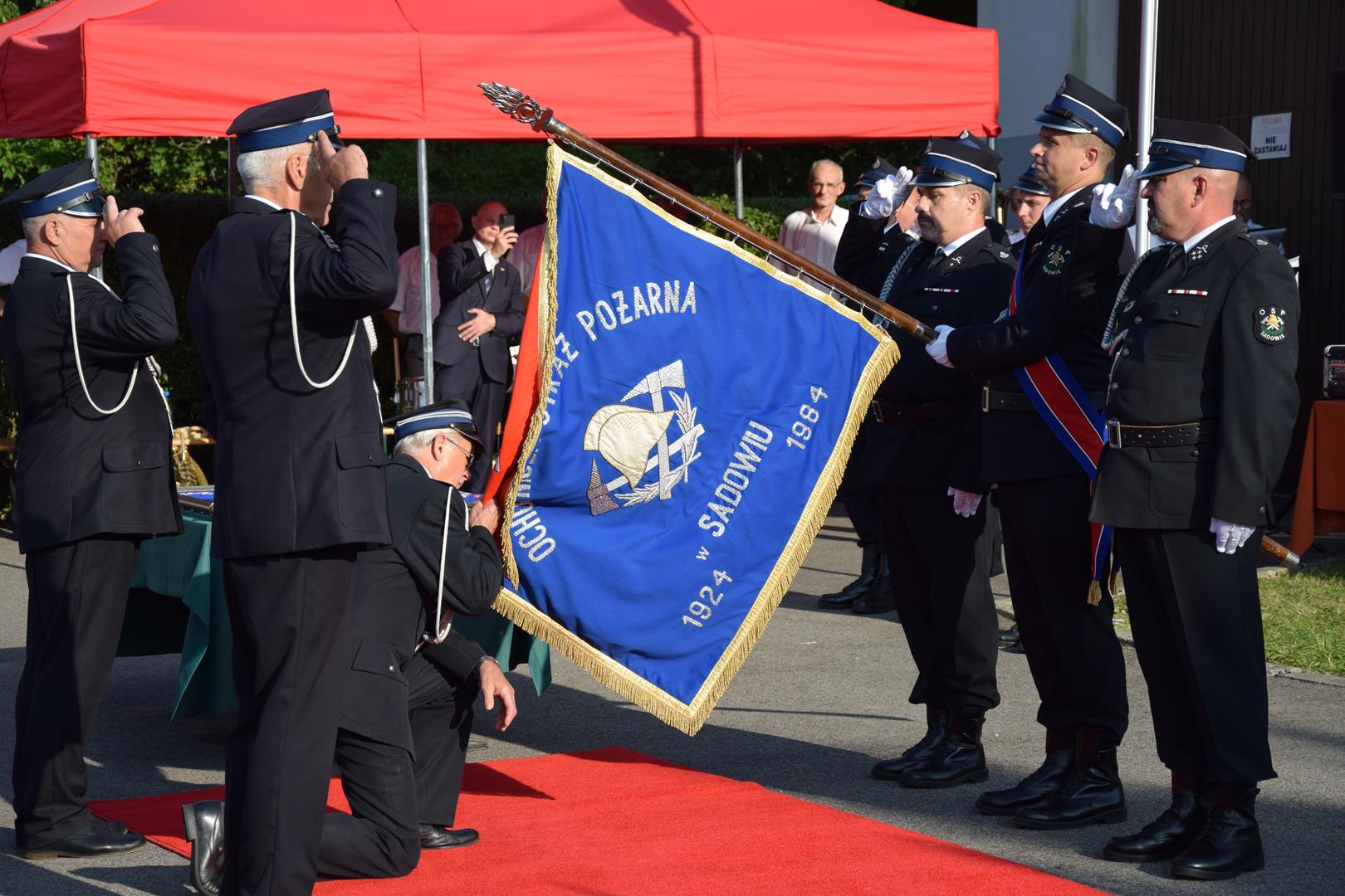 Zdjęcie przedstawia fragment uroczystości 100 lecia OSP Toporowice